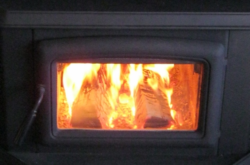Even though it's very cold outside, we're warm and cozy by the fire.